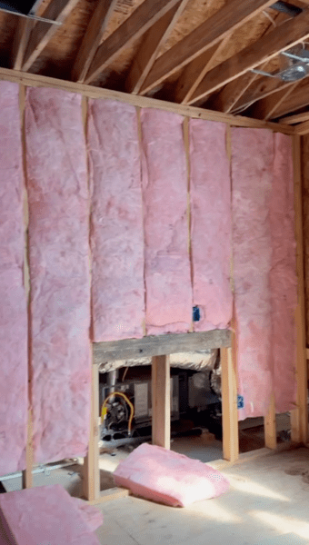 fiberglass batt insulation installed in a new built construction home