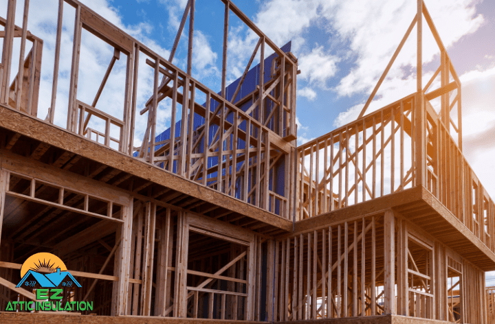 New construction with open walls, ideal for installing new insulation.