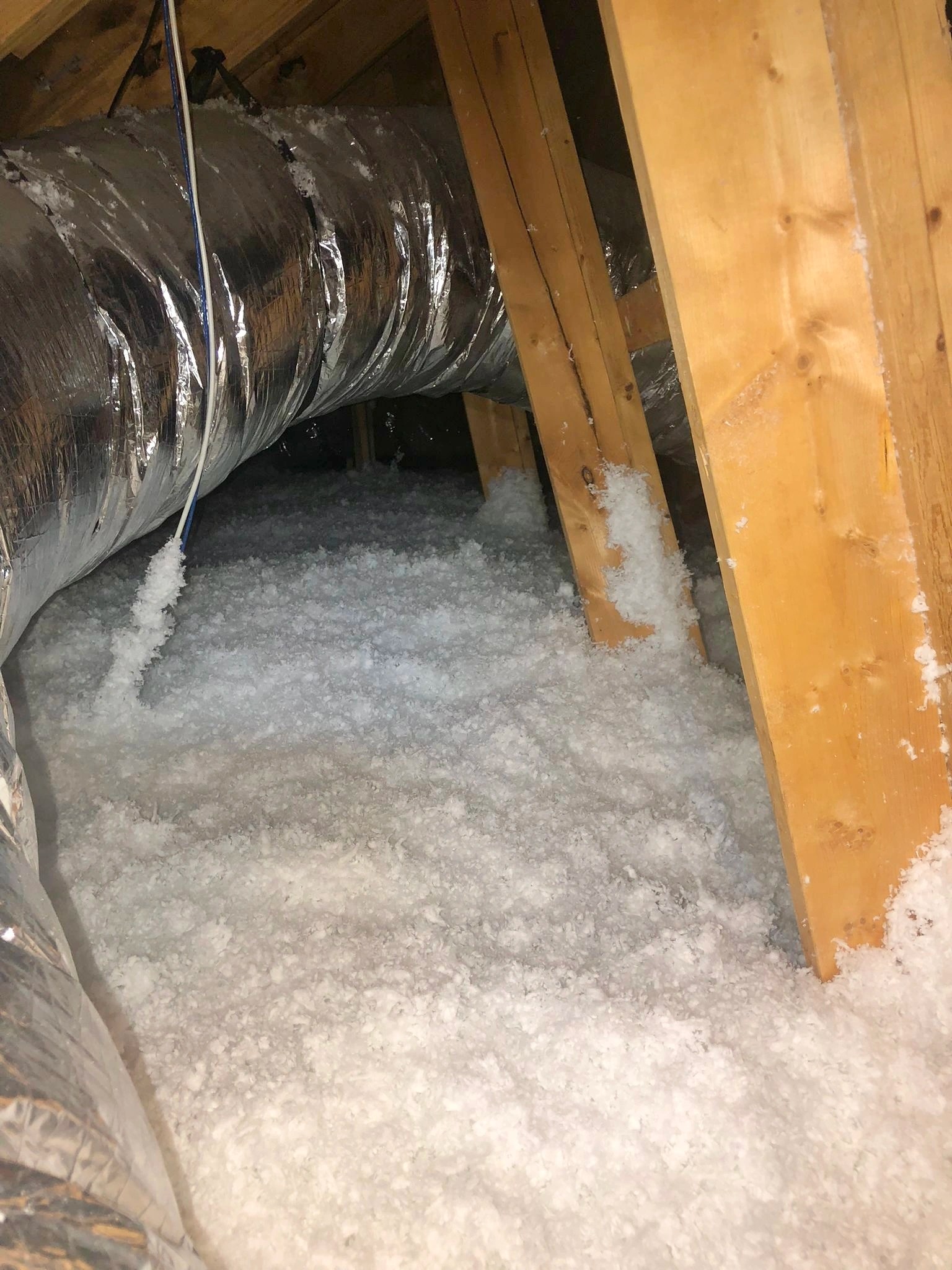 New insulation installed across a residential attic