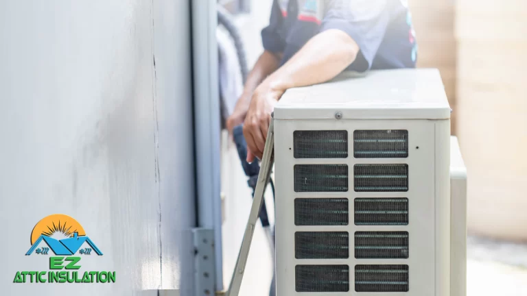 EZ Attic Technician performing maintenance on HVAC unit.