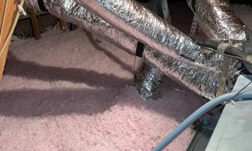 new fiberglass insulation in an attic